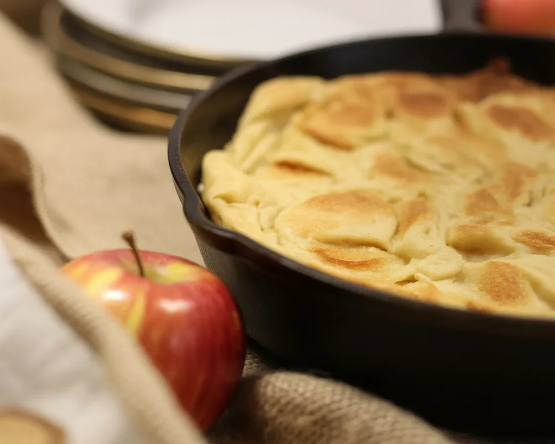 Delicious Apple Puff Pancake baked with cinnamon and fresh apples